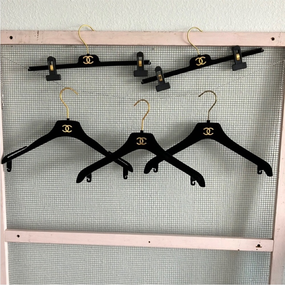 5 authentic Chanel black velvet hangers w gold accents-sold as a lot